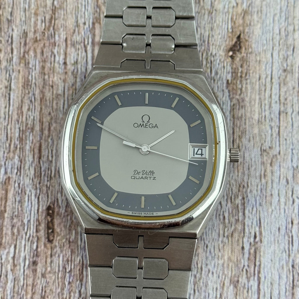 1970s Omega De Ville quartz men’s blue dial integrated bracelet wrist watch 35mm