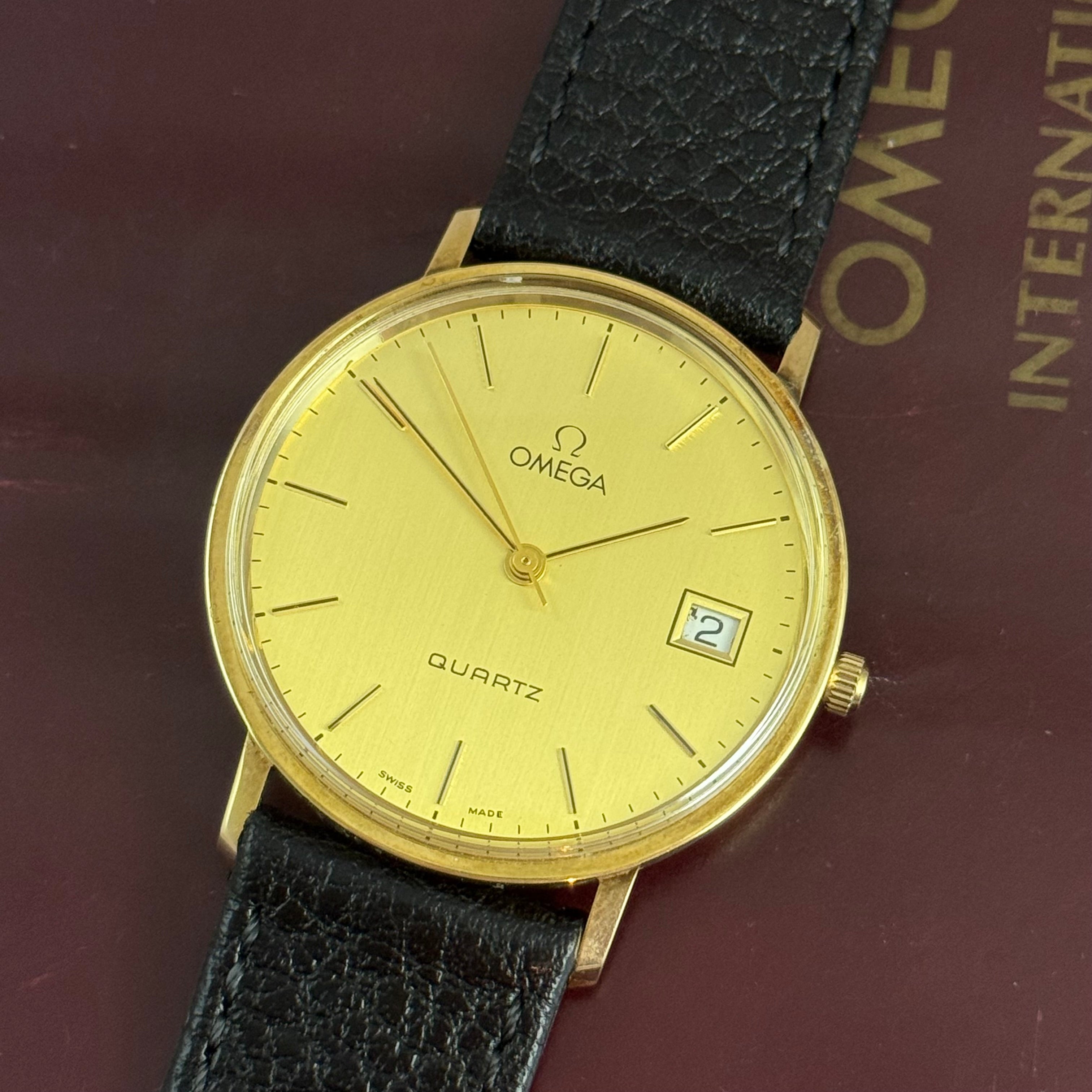 9ct solid gold Omega quartz men’s wrist watch 34mm with guarantee circa 1988