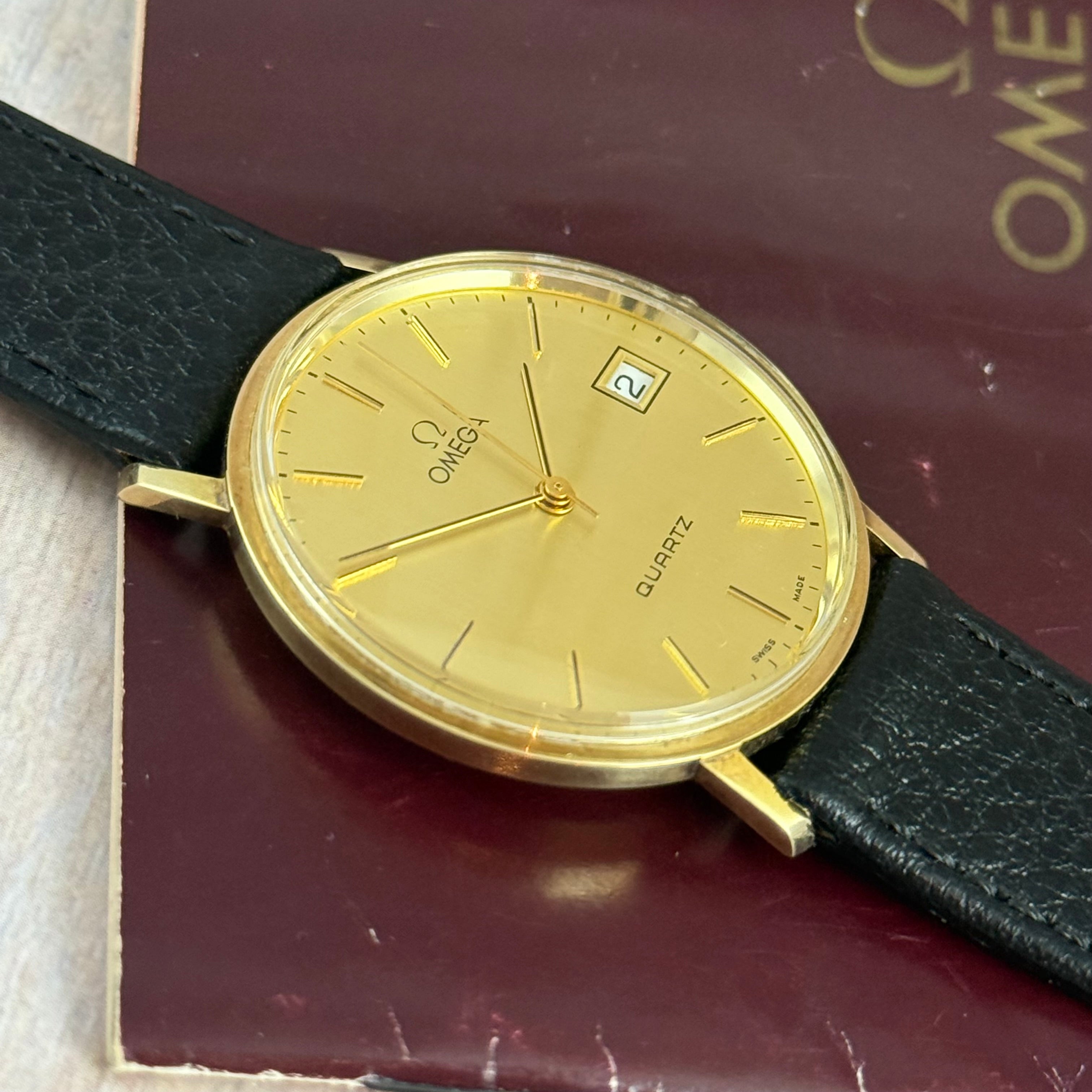 9ct solid gold Omega quartz men’s wrist watch 34mm with guarantee circa 1988
