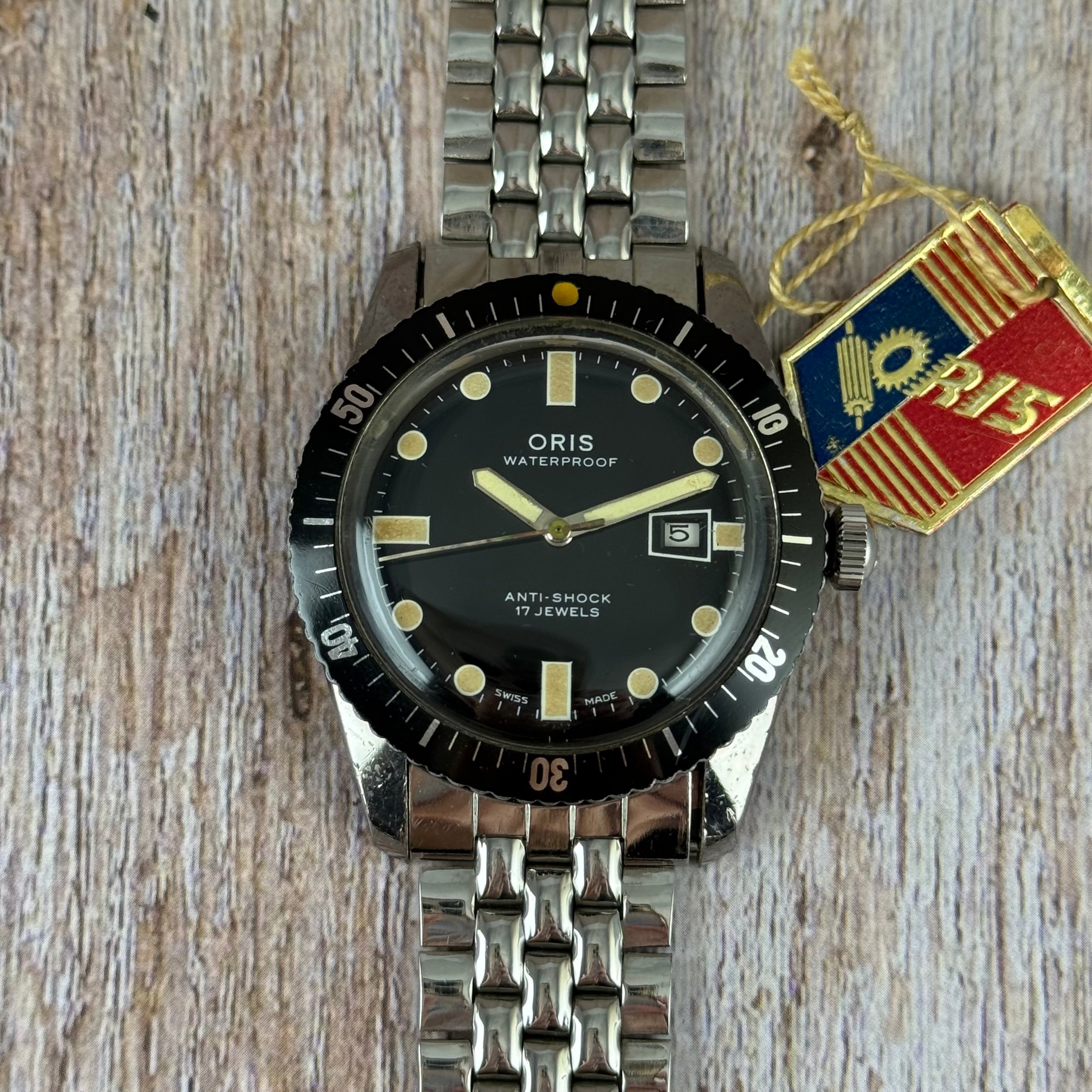 The original Oris 65 Iconic Divers mens watch box & tag
