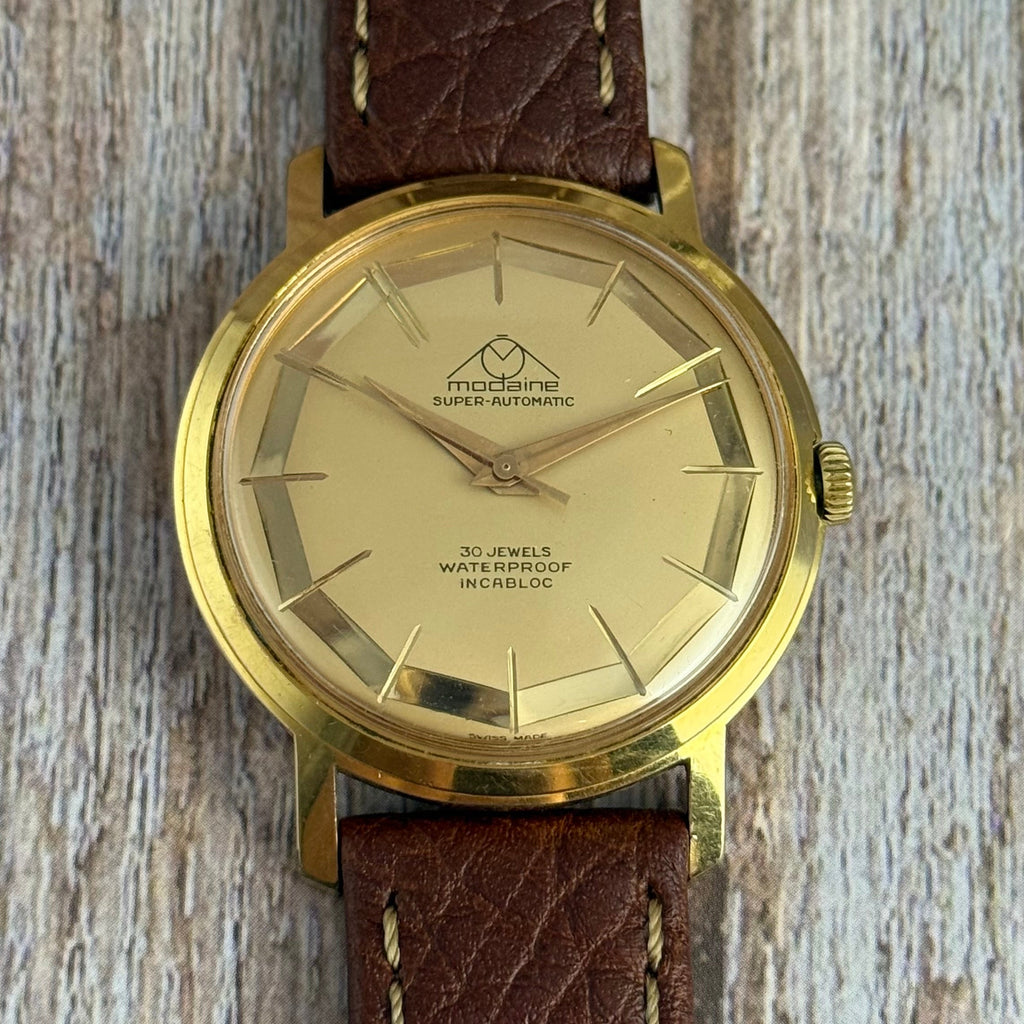 1970s Mondaine automatic “mirror web” dial men’s rose gold plated wrist watch 35mm