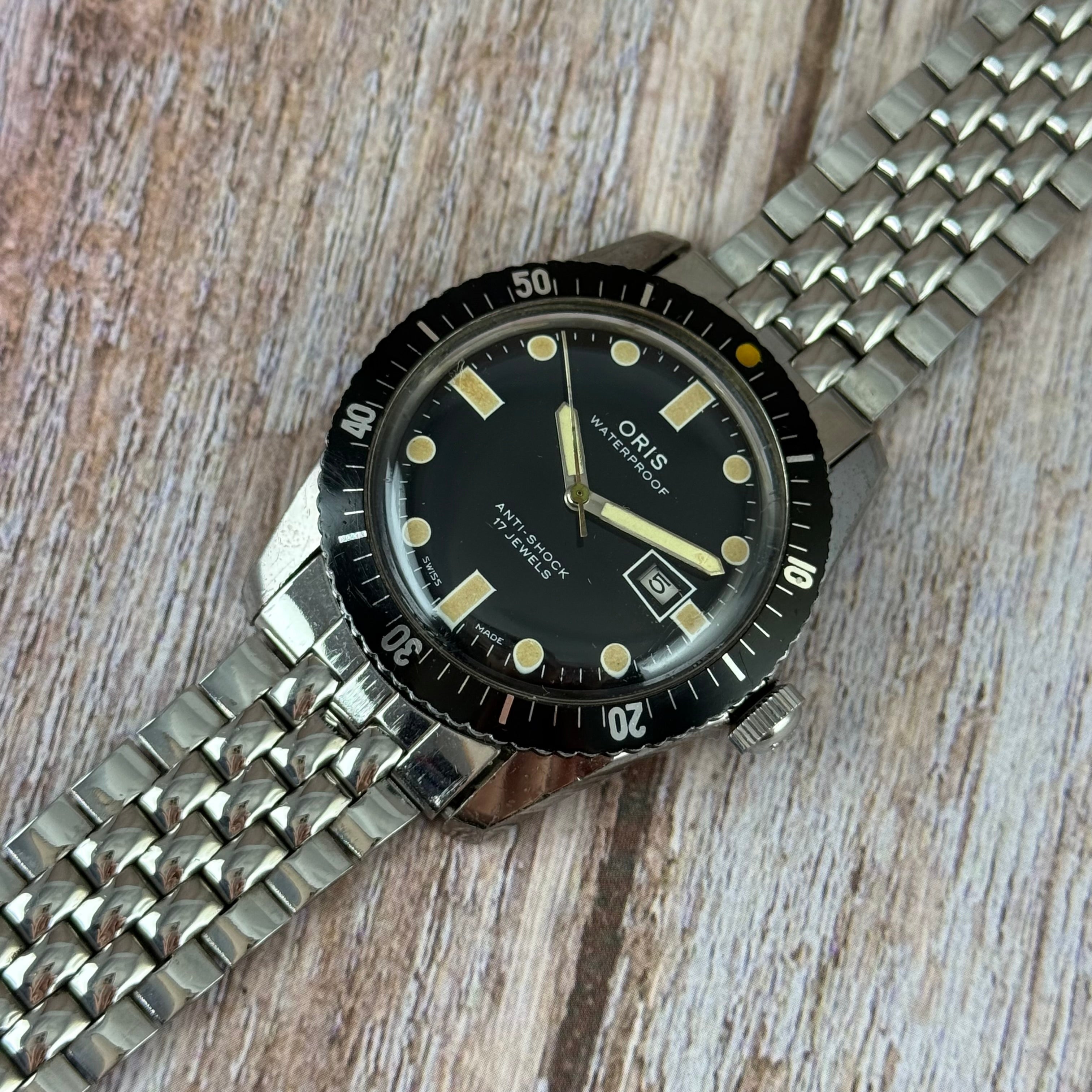 The original Oris 65 Iconic Divers mens watch box & tag