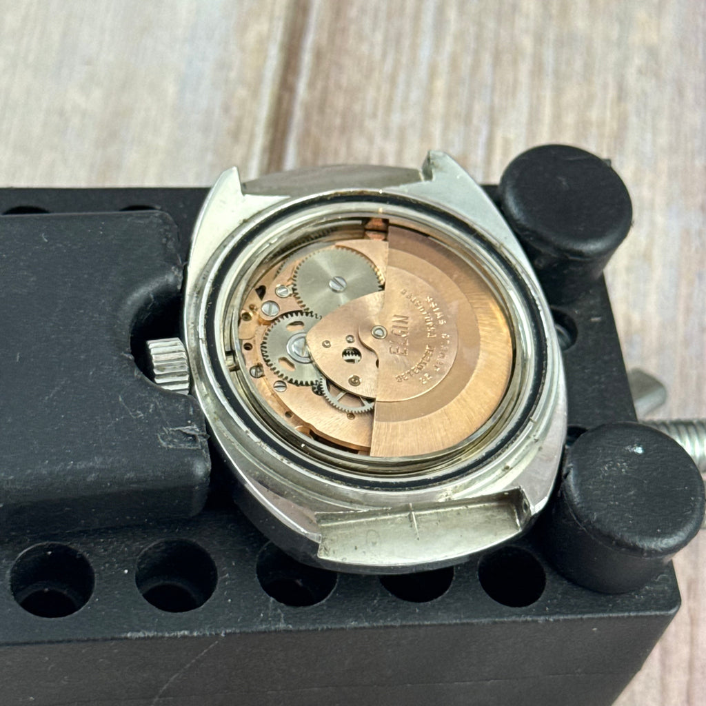 1970s Elgin men’s divers watch automatic 37mm date Bakelite bezel