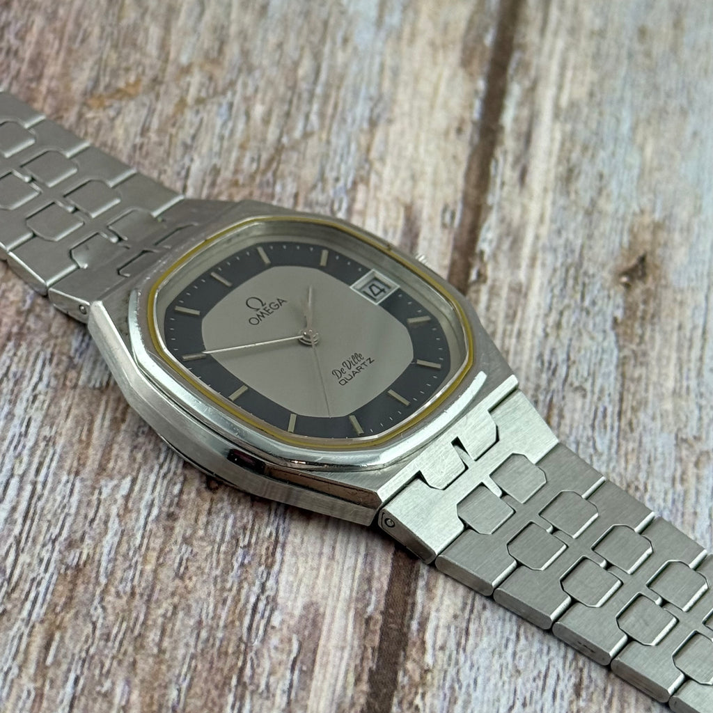 1970s Omega De Ville quartz men’s blue dial integrated bracelet wrist watch 35mm