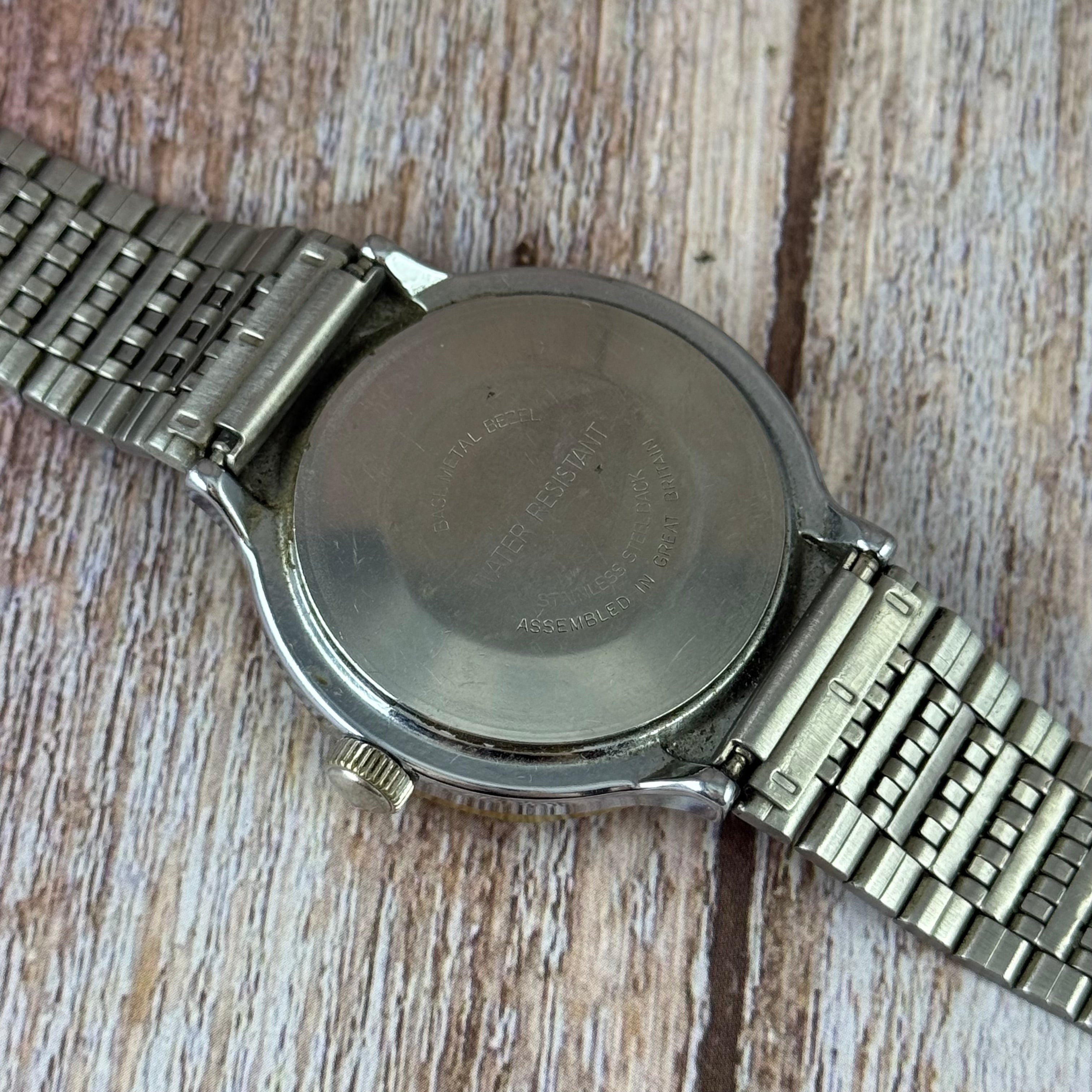 1970s Timex “porthole” men’s Manual wind wrist watch grey dial made in Great Britain