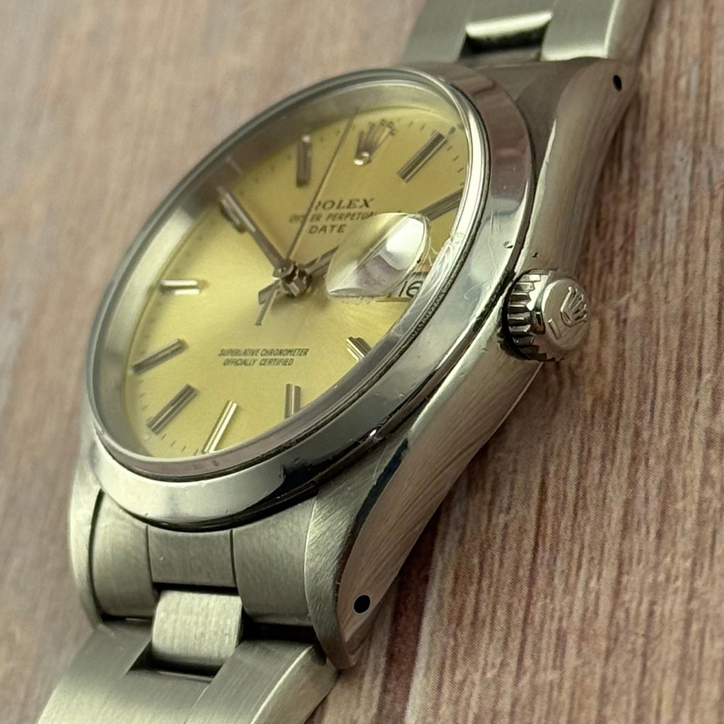 1990 Rolex Oyster Perpetual Date men’s steel champagne dial watch boxed