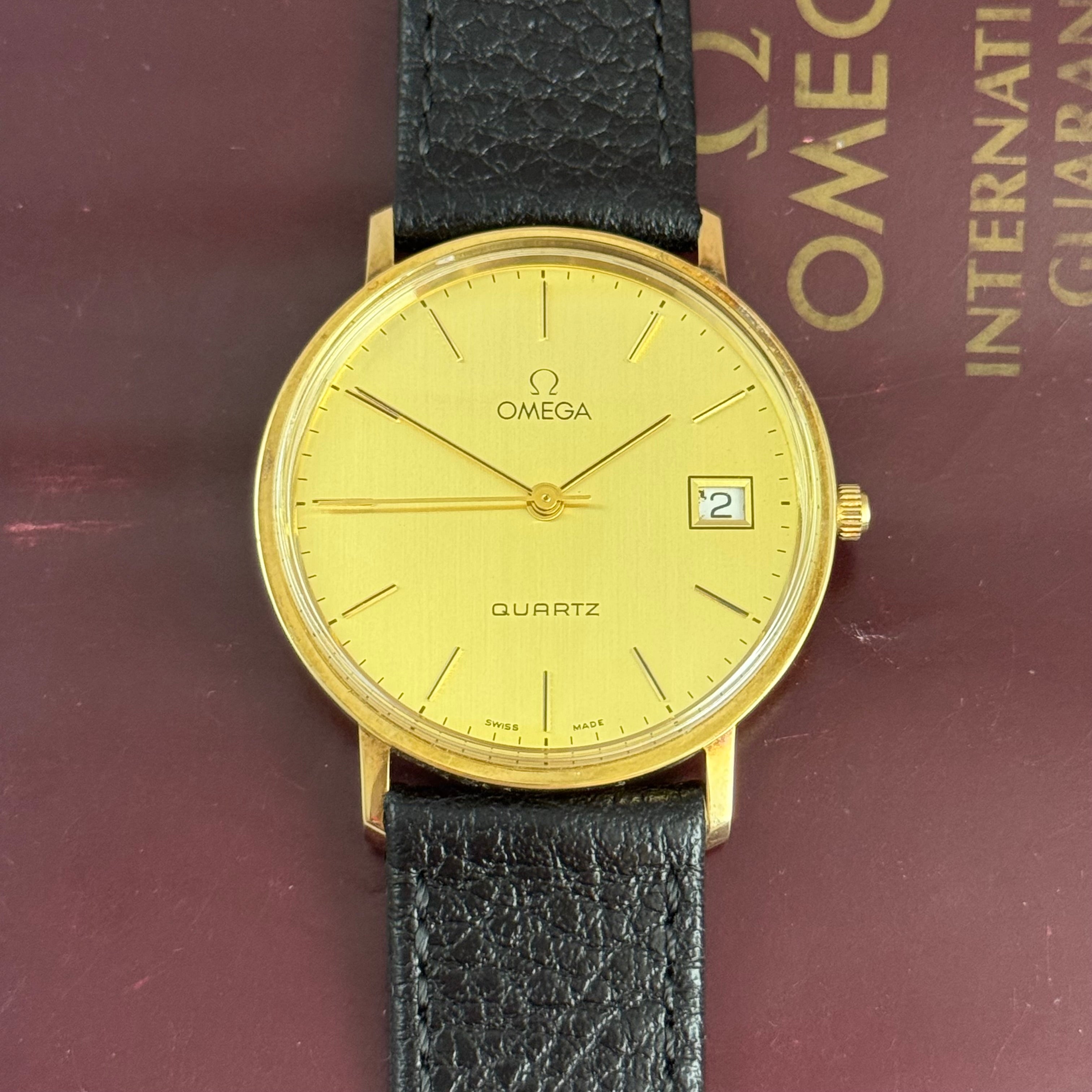 9ct solid gold Omega quartz men’s wrist watch 34mm with guarantee circa 1988