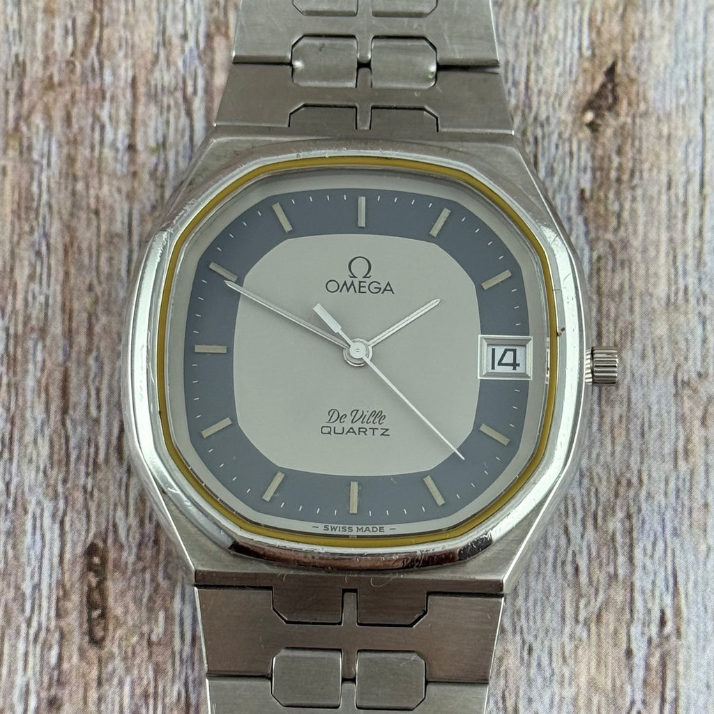 1970s Omega De Ville quartz men’s blue dial integrated bracelet wrist watch 35mm