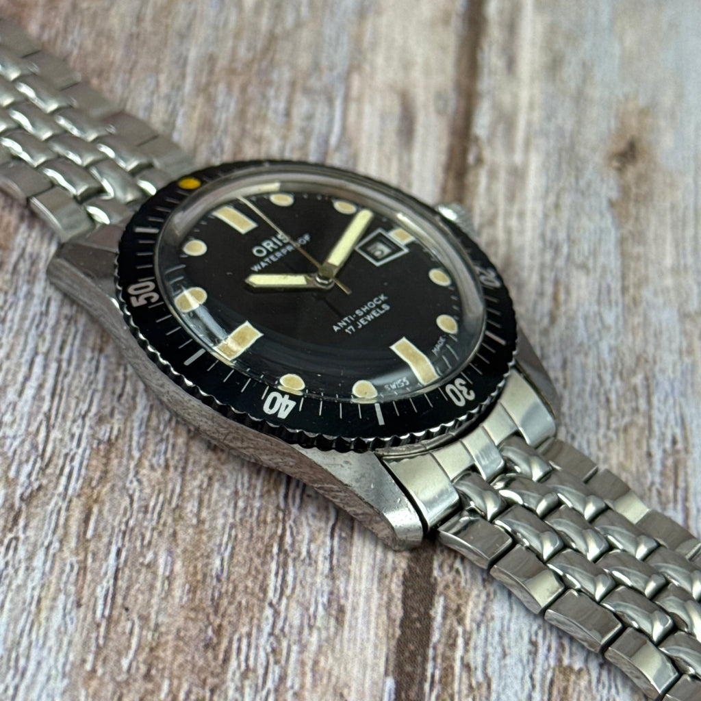 The original Oris 65 Iconic Divers mens watch box & tag