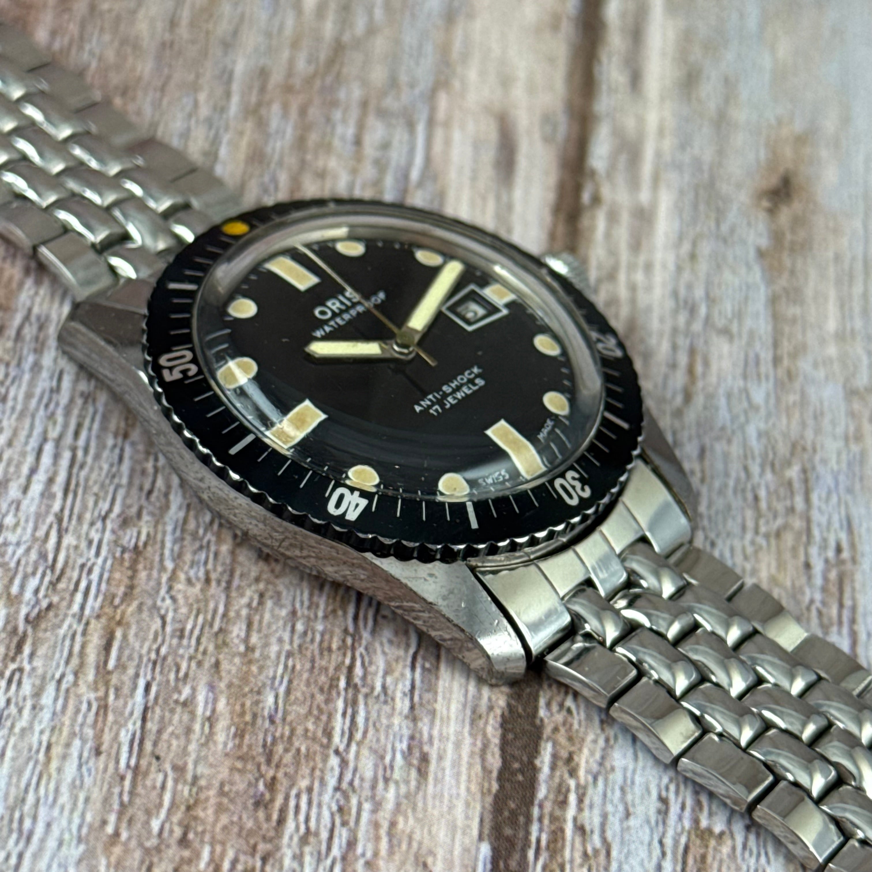 The original Oris 65 Iconic Divers mens watch box & tag