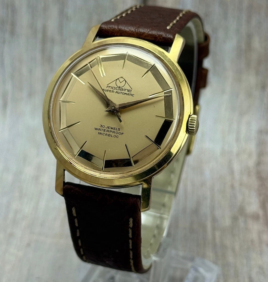 1970s Mondaine automatic “mirror web” dial men’s rose gold plated wrist watch 35mm