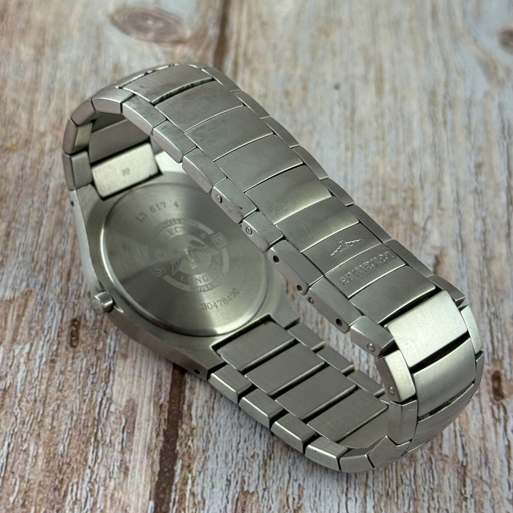 Neo vintage Longines Oposition mens wrist watch Quartz Ref L3.617.4 White textured Dial