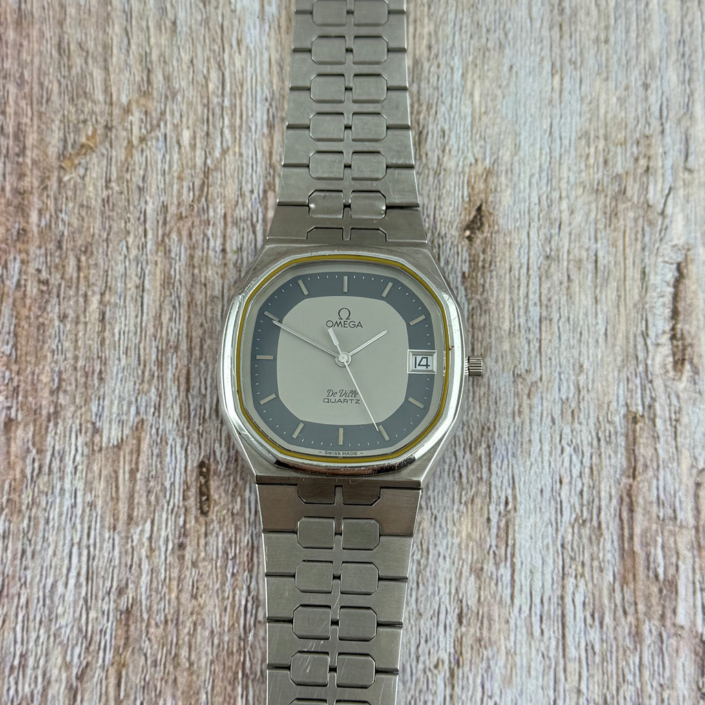 1970s Omega De Ville quartz men’s blue dial integrated bracelet wrist watch 35mm
