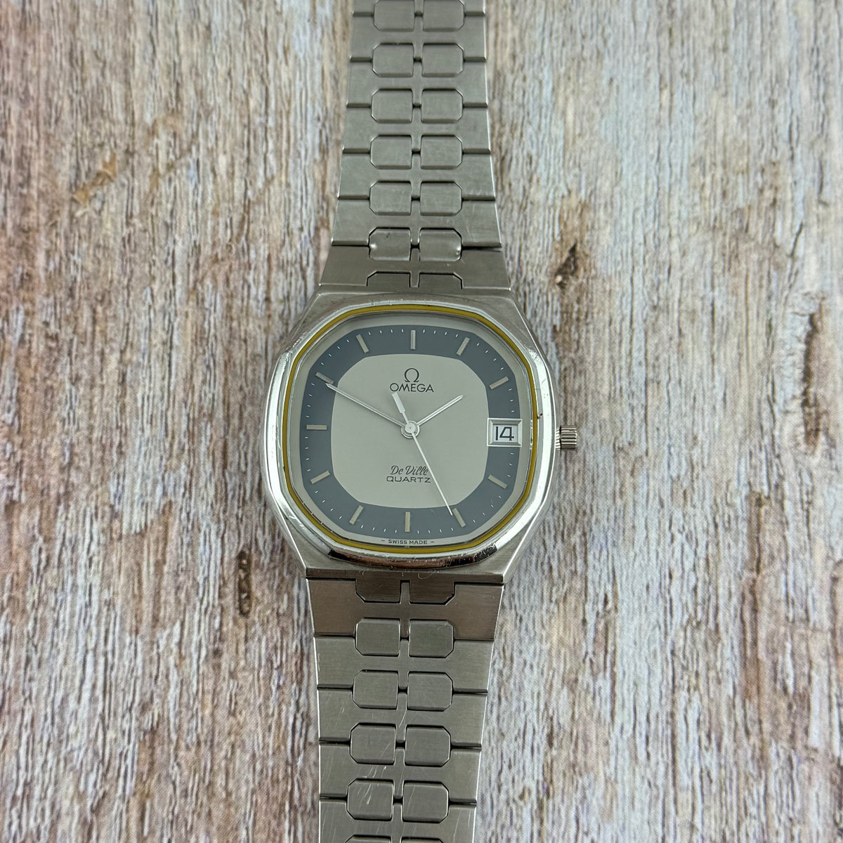 1970s Omega De Ville quartz men’s blue dial integrated bracelet wrist watch 35mm