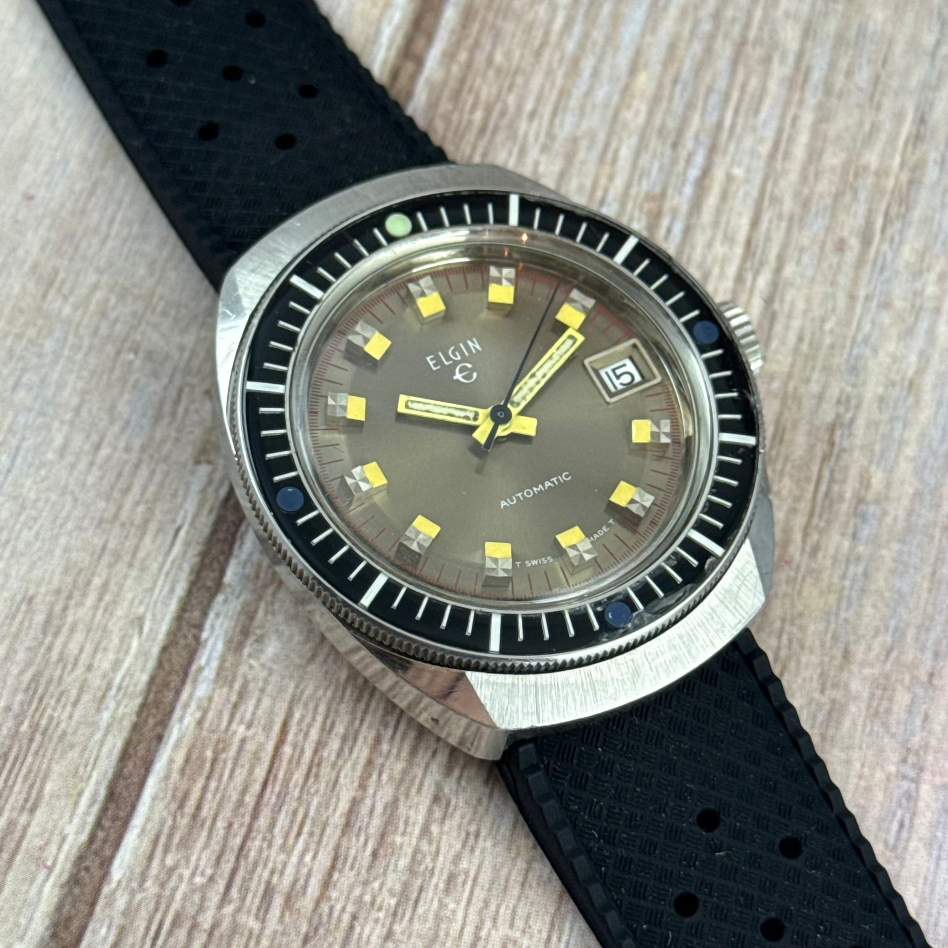 1970s Elgin men’s divers watch automatic 37mm date Bakelite bezel