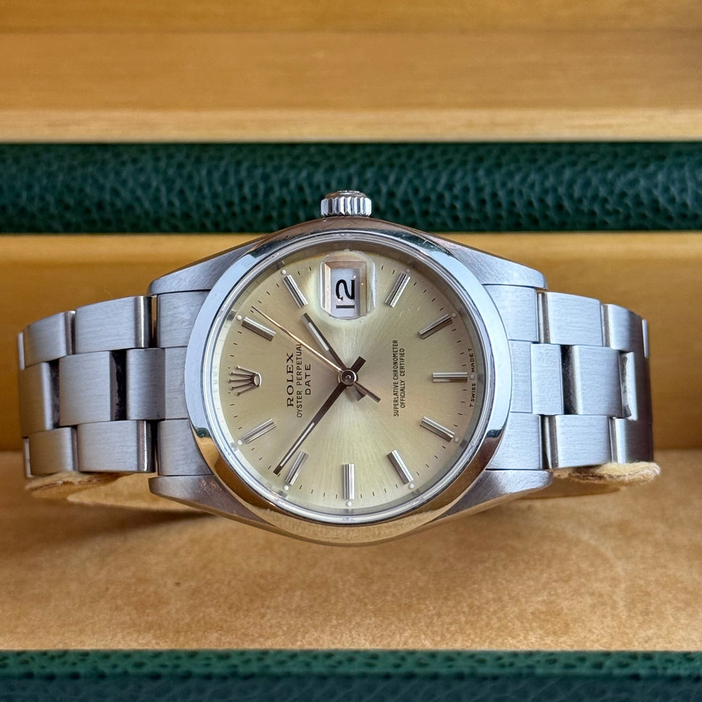 1990 Rolex Oyster Perpetual Date men’s steel champagne dial watch boxed