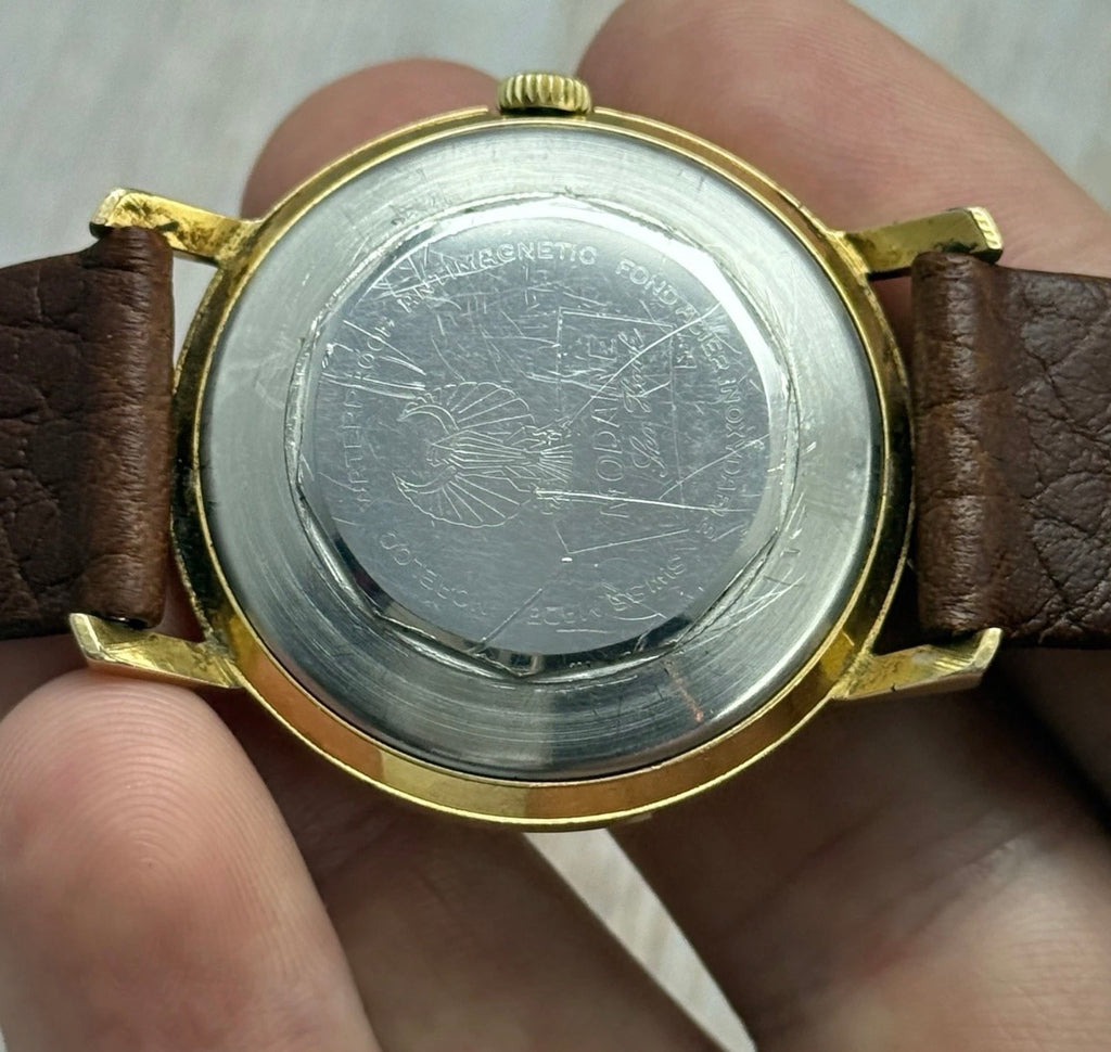 1970s Mondaine automatic “mirror web” dial men’s rose gold plated wrist watch 35mm