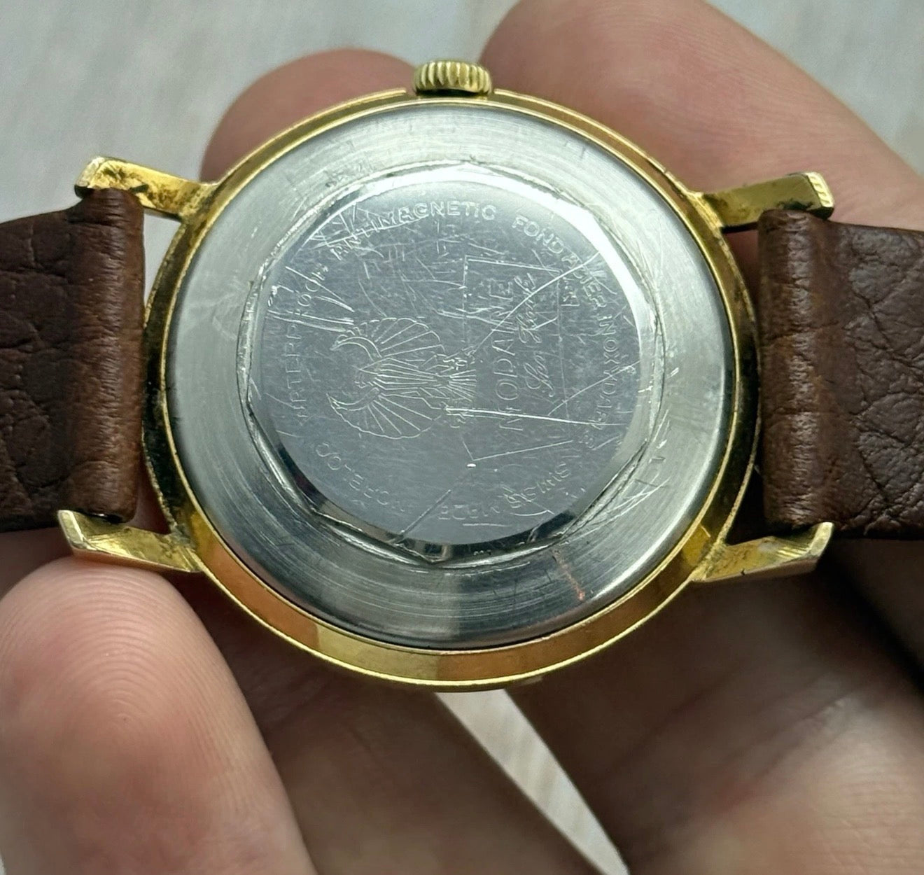 1970s Mondaine automatic “mirror web” dial men’s rose gold plated wrist watch 35mm