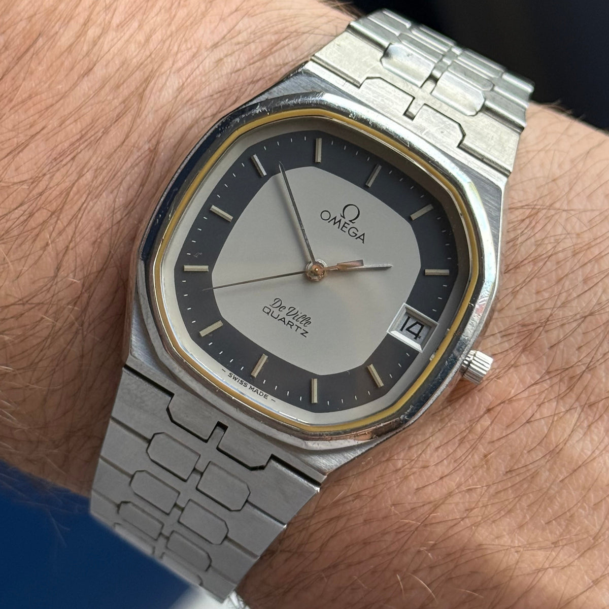 1970s Omega De Ville quartz men’s blue dial integrated bracelet wrist watch 35mm