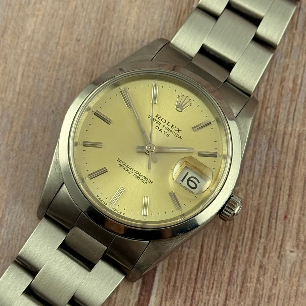 1990 Rolex Oyster Perpetual Date men’s steel champagne dial watch boxed