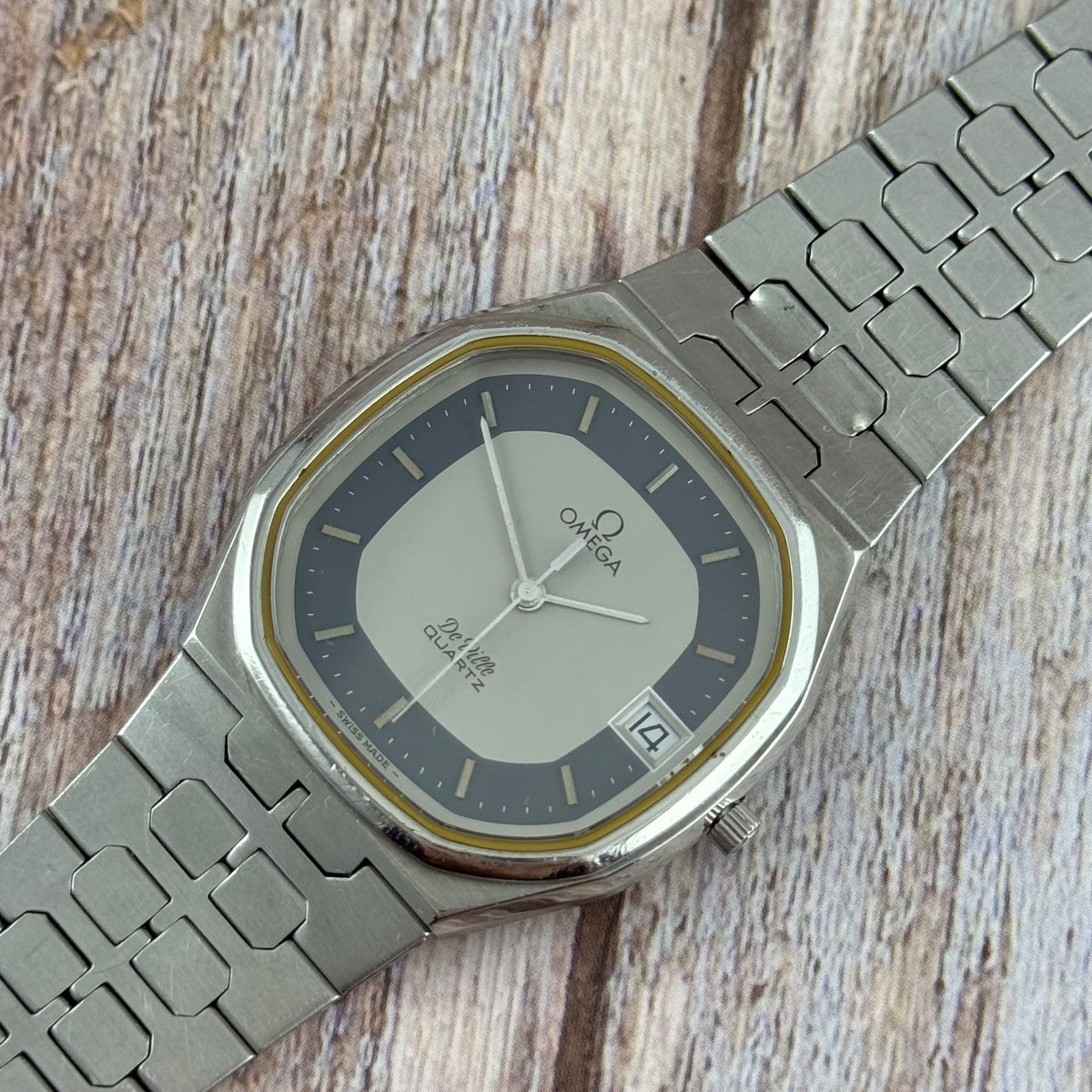 1970s Omega De Ville quartz men’s blue dial integrated bracelet wrist watch 35mm