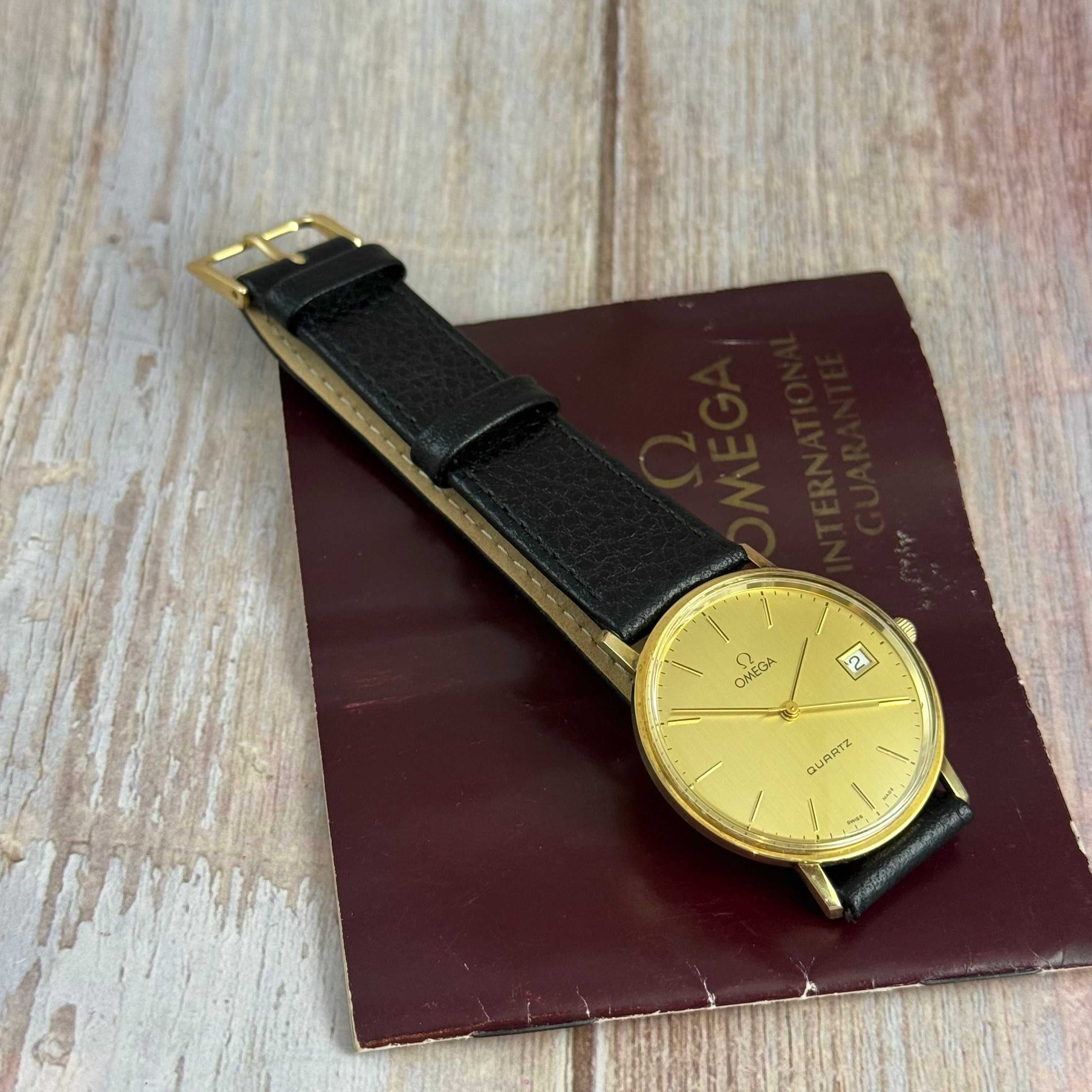 9ct solid gold Omega quartz men’s wrist watch 34mm with guarantee circa 1988