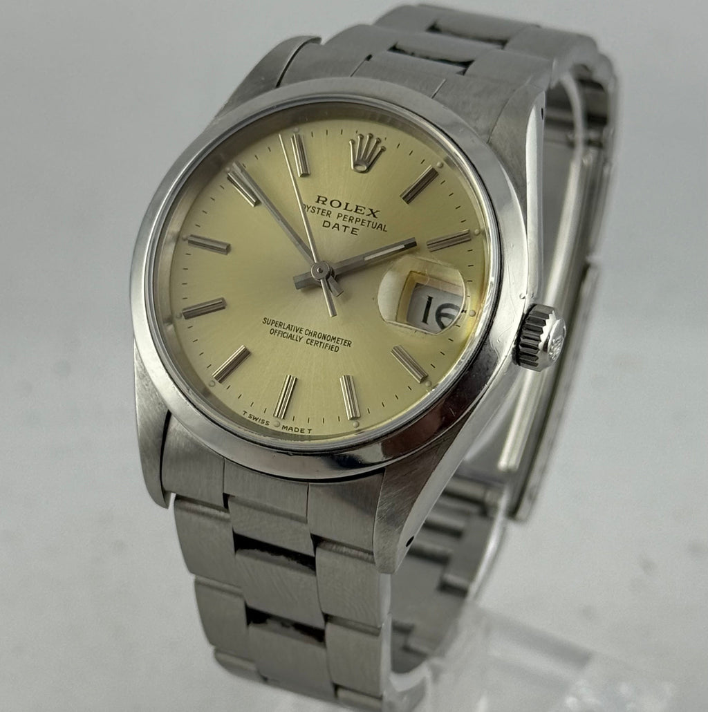 1990 Rolex Oyster Perpetual Date men’s steel champagne dial watch boxed