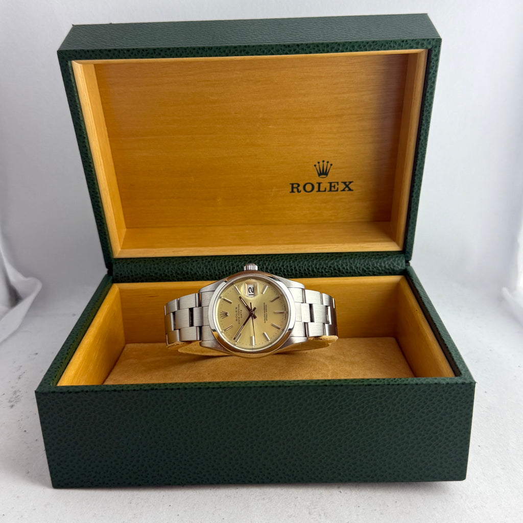1990 Rolex Oyster Perpetual Date men’s steel champagne dial watch boxed
