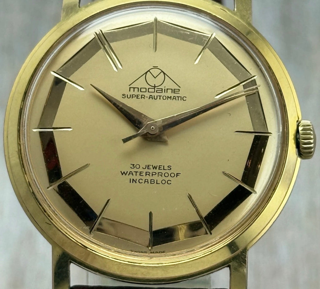 1970s Mondaine automatic “mirror web” dial men’s rose gold plated wrist watch 35mm