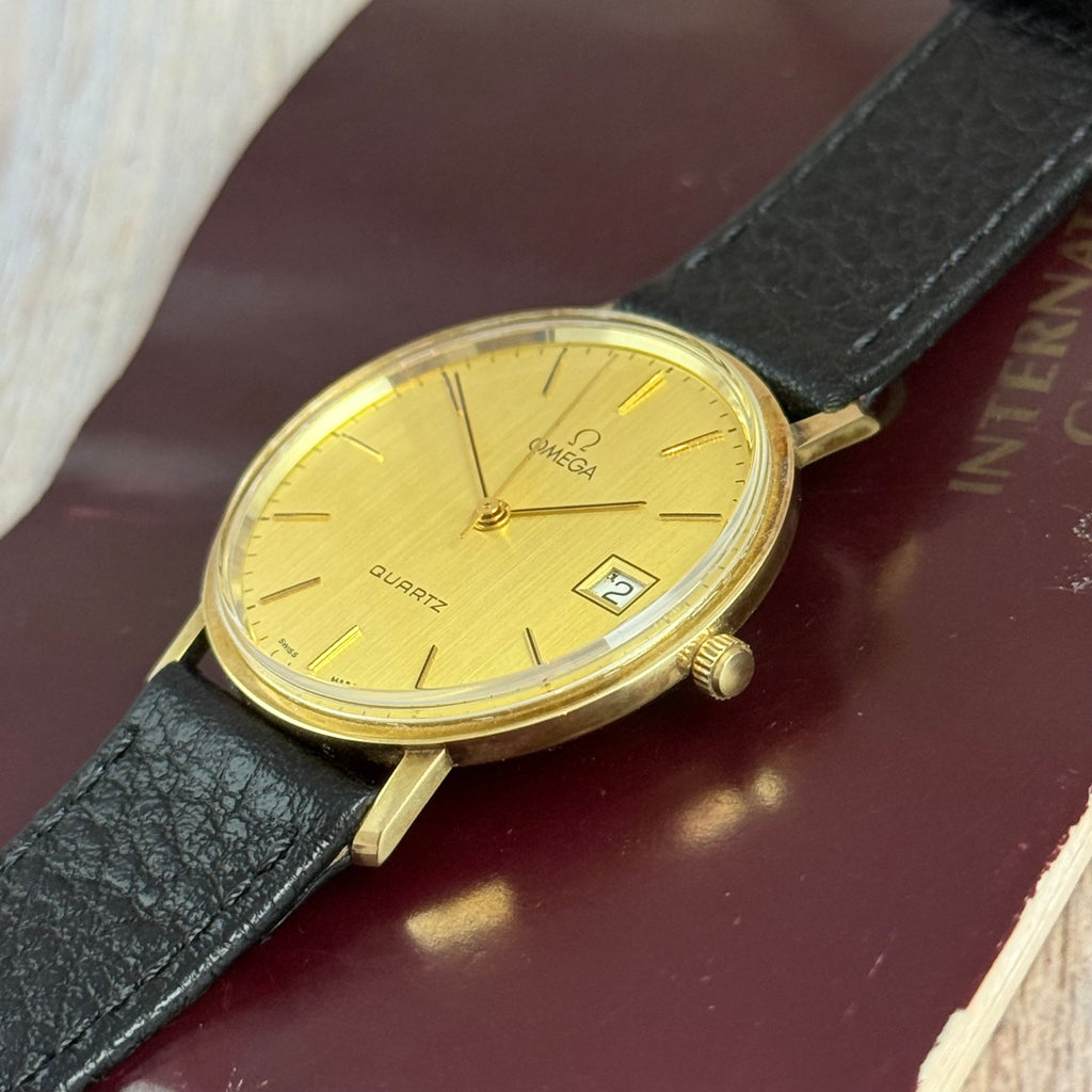 9ct solid gold Omega quartz men’s wrist watch 34mm with guarantee circa 1988
