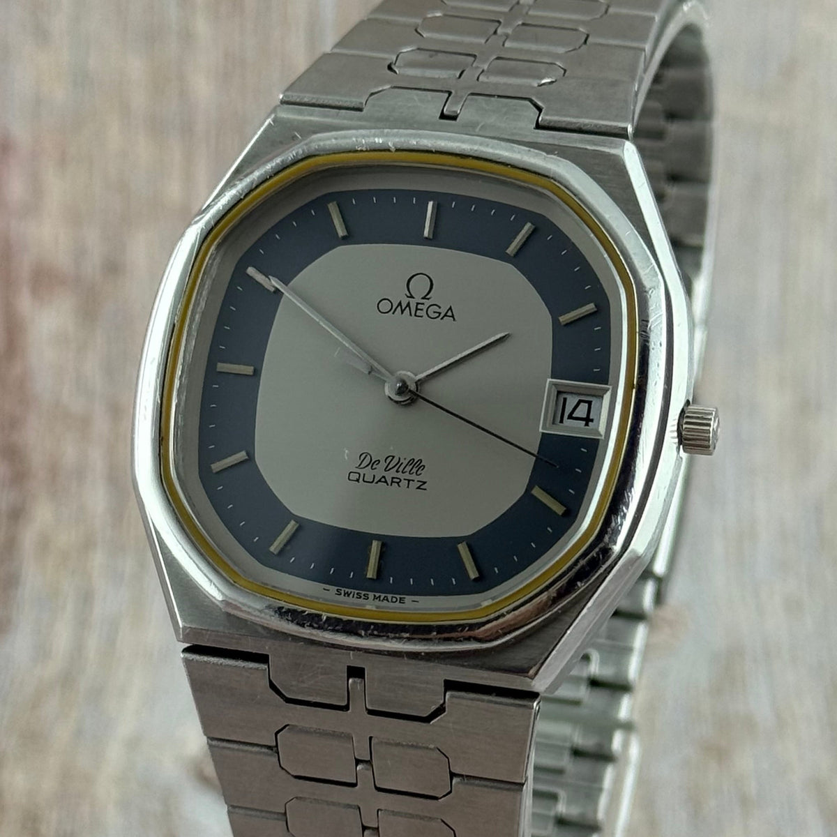 1970s Omega De Ville quartz men’s blue dial integrated bracelet wrist watch 35mm