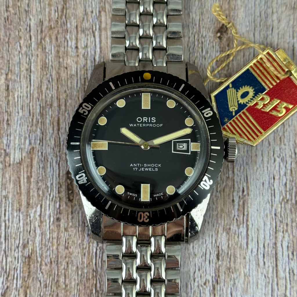 The original Oris 65 Iconic Divers mens watch box & tag