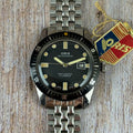 The original Oris 65 Iconic Divers mens watch box & tag