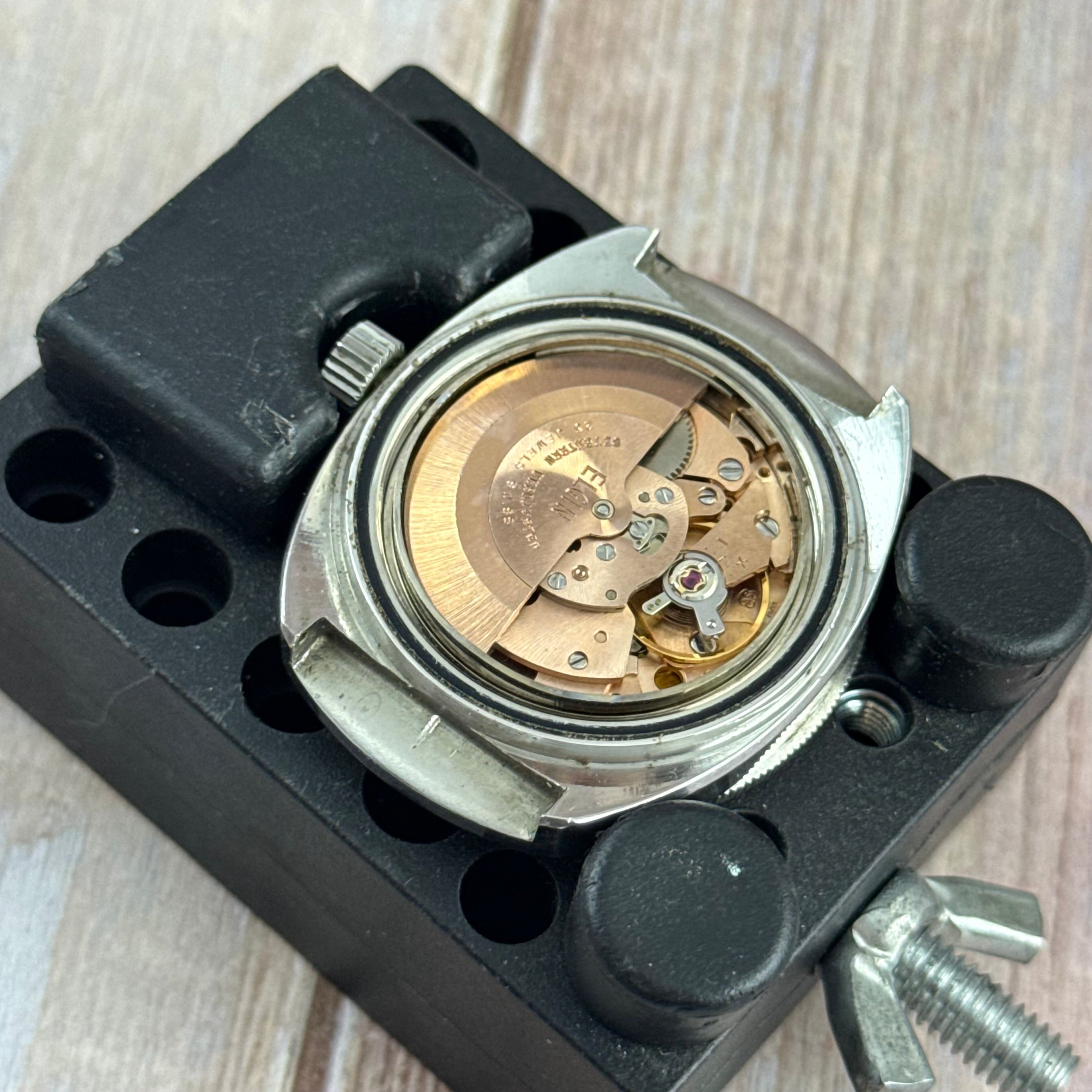 1970s Elgin men’s divers watch automatic 37mm date Bakelite bezel