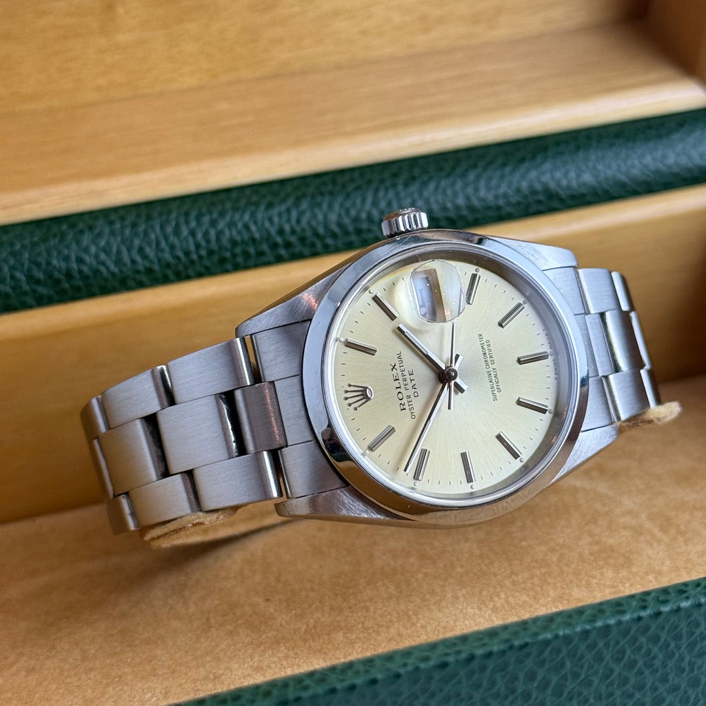 1990 Rolex Oyster Perpetual Date men’s steel champagne dial watch boxed