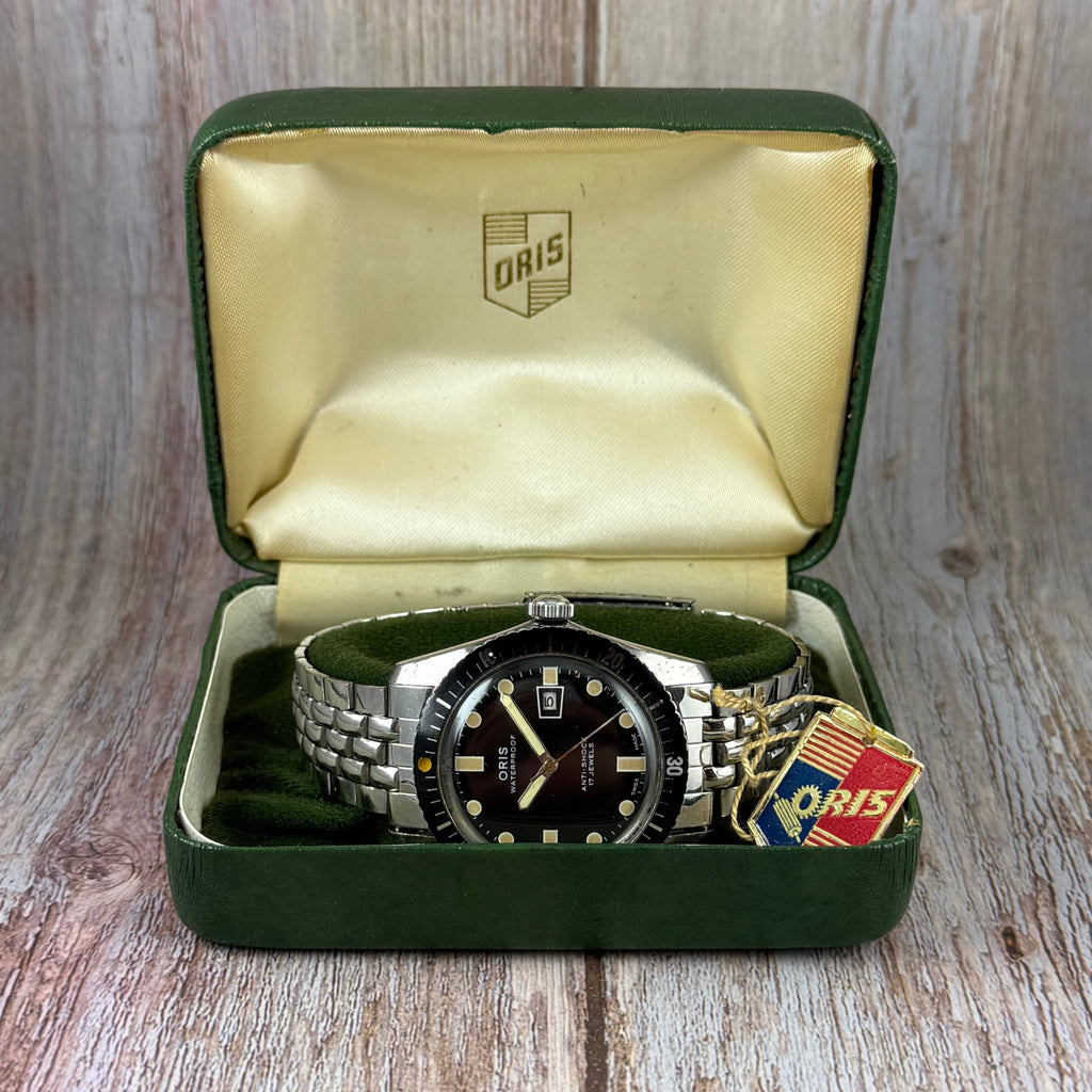 The original Oris 65 Iconic Divers mens watch box & tag