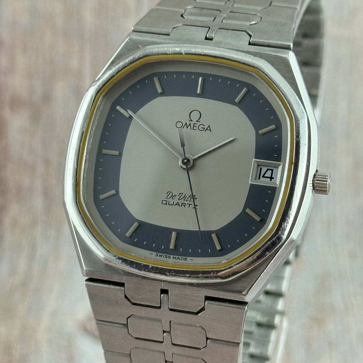 1970s Omega De Ville quartz men’s blue dial integrated bracelet wrist watch 35mm