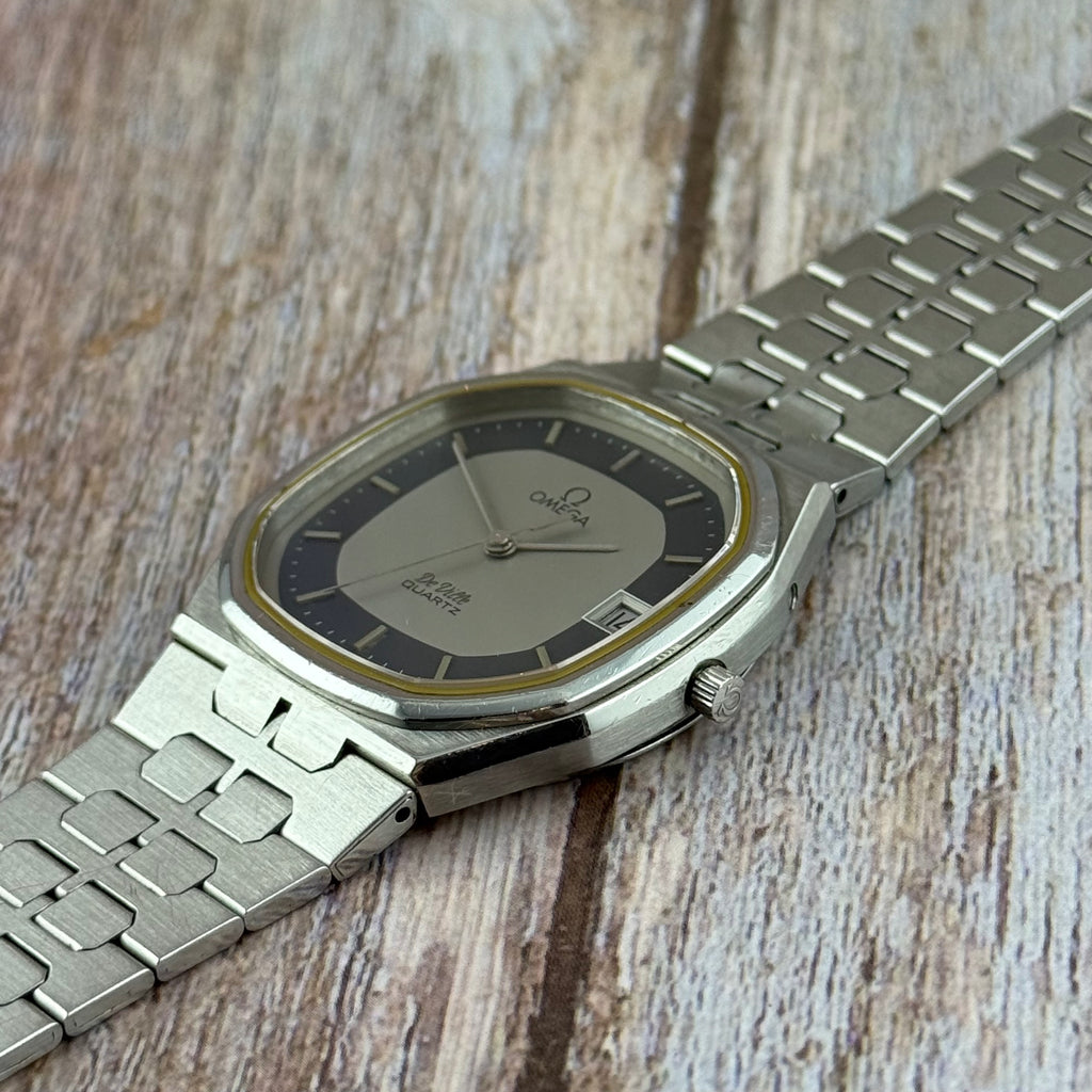 1970s Omega De Ville quartz men’s blue dial integrated bracelet wrist watch 35mm