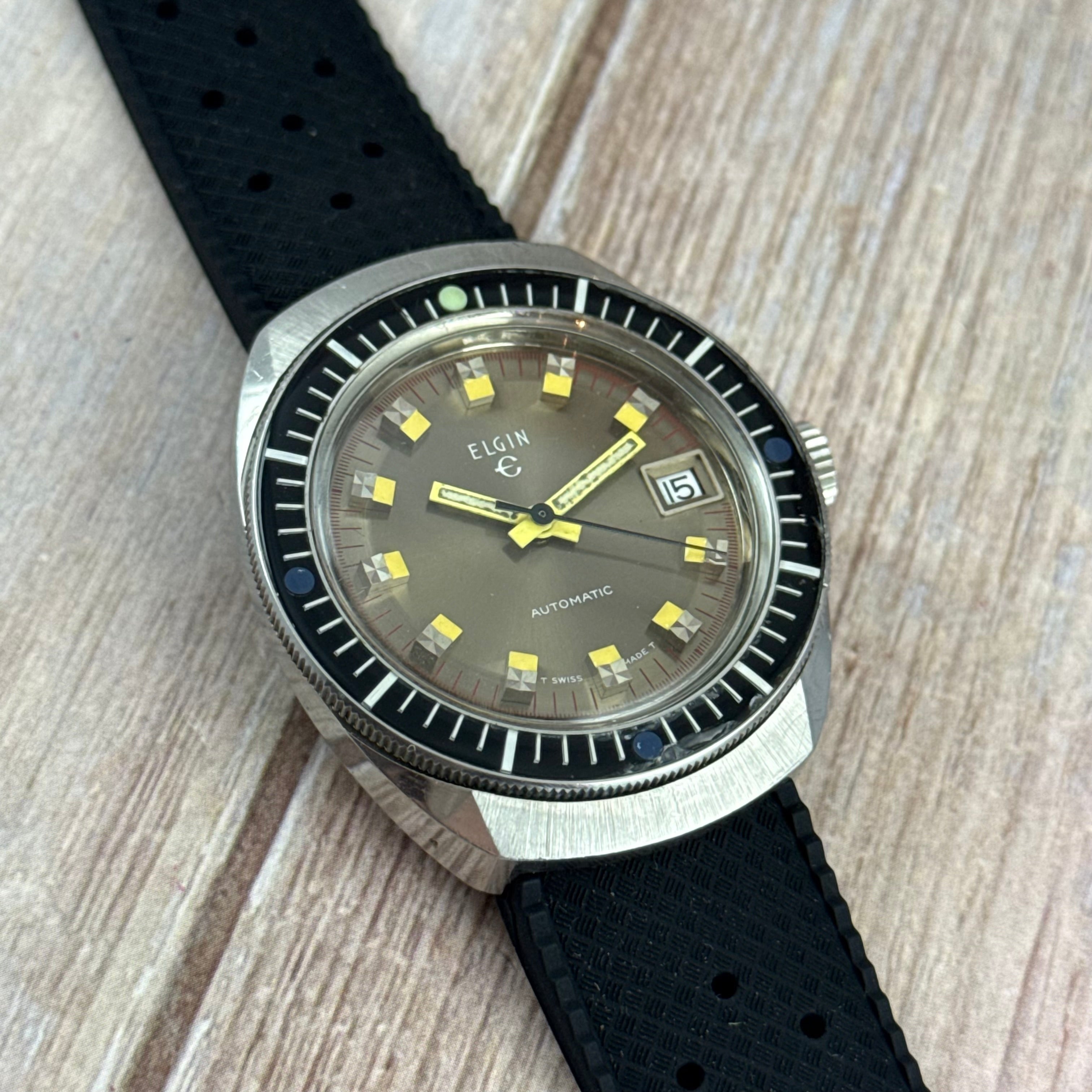 1970s Elgin men’s divers watch automatic 37mm date Bakelite bezel